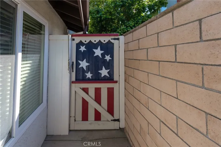 Patriotic gate to backyard