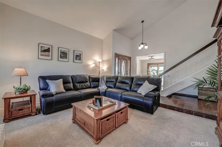 Enter into a warm and inviting formal Living Room where family and friends gather to be together! Game night!