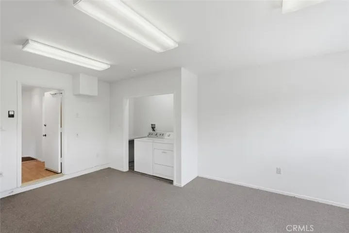 Garage with laundry and lighting