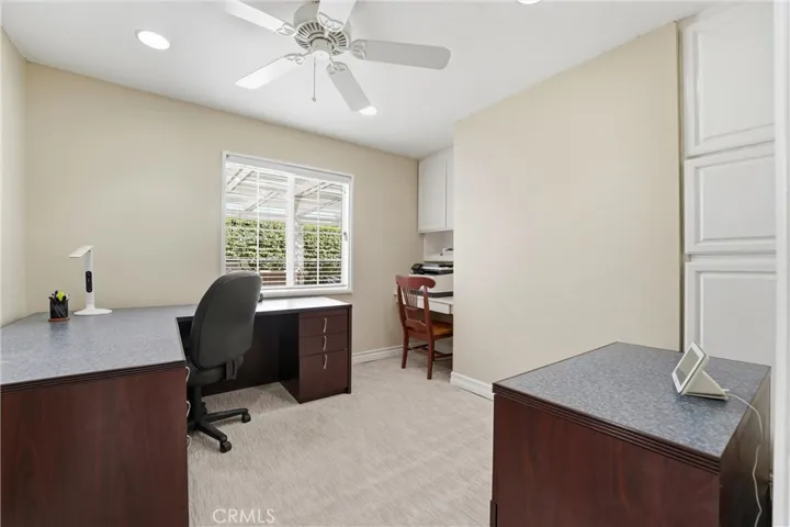 Another of three secondary bedrooms, currently used as home office.