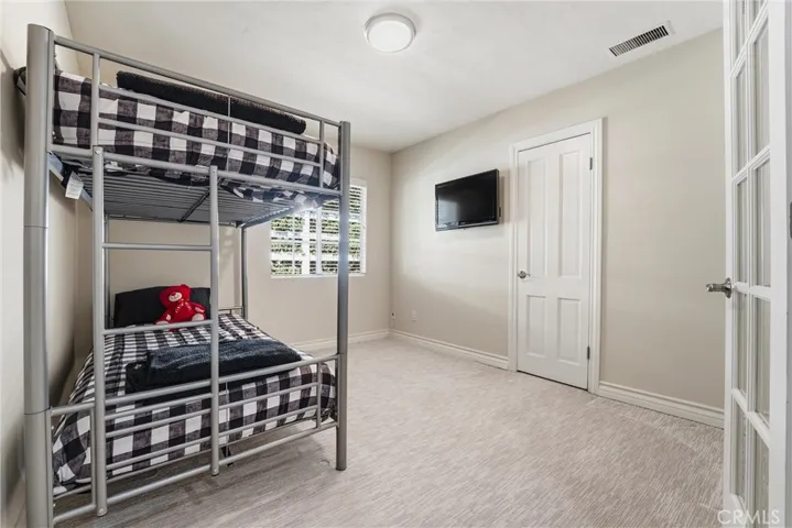 One of three secondary bedrooms.