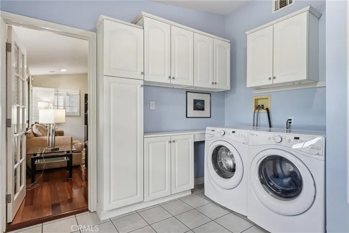 Separate indoor laundry room.