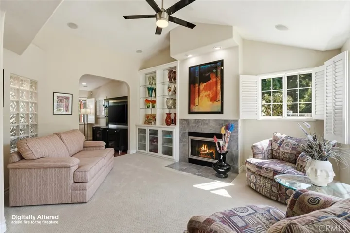 Cozy conversation room with fireplace.