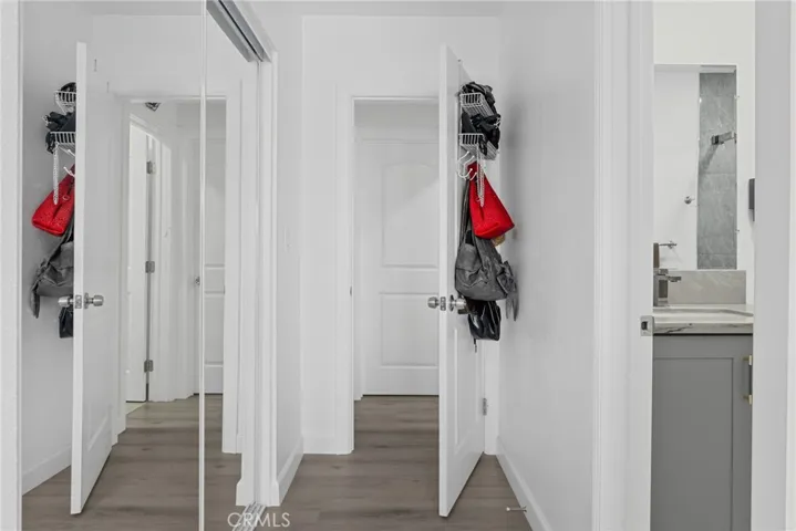 Door entry bathroom access of primary bedroom