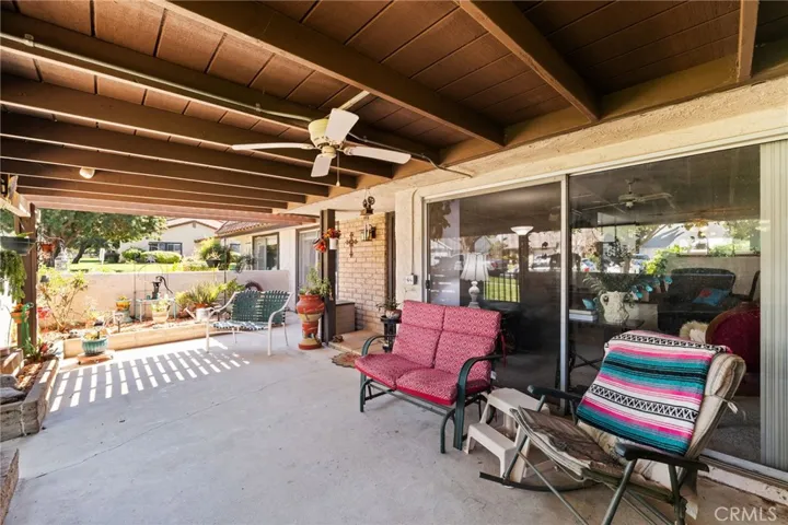 This home may not have a yard to maintain (which saves costs) it offers a HUGE covered patio - plenty of space for a BBQ and seating - if you like to garden, it has a space for that too. By the way, the cover was recently replaced!