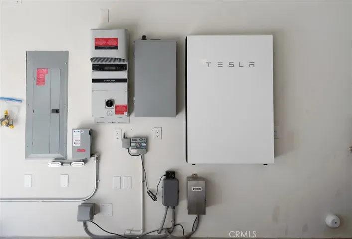 Solar powered Tesla Powerwall in the garage.