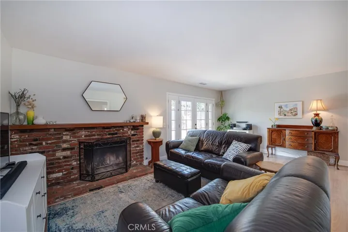 The cozy fireplace in the living room will keep you warm on those chilly nights.