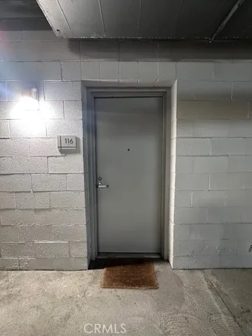 FIRST FLOOR BACK ENTRANCE FROM PARKING STRUCTURE