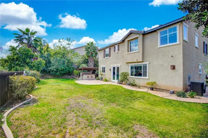 Your private Riverside retreat. This oversized lot features a manicured lawn, a built-in BBQ station, and plenty of space for a future pool or garden—all with the added benefit of no rear neighbors for ultimate privacy.