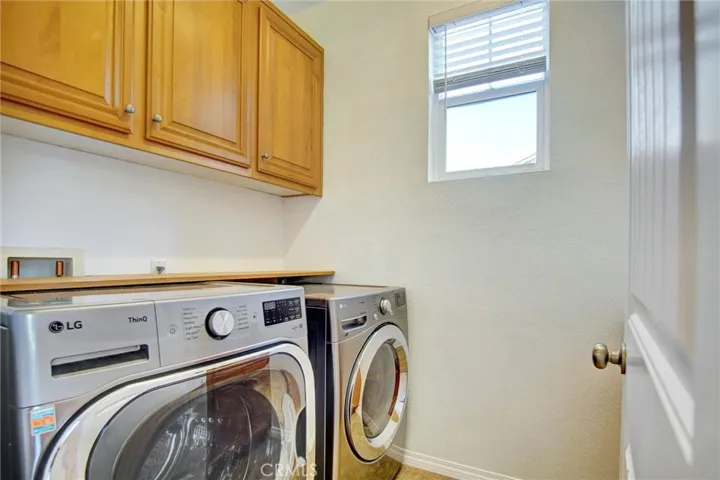Laundry room with sink.