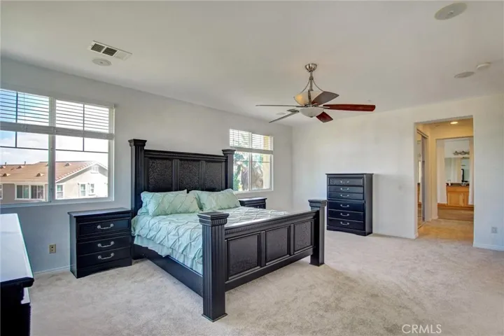 Large Primary suite with walk in closet and spa inspired bathroom.