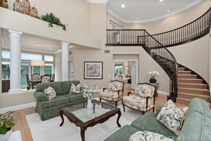 cathedral ceilings and sweeping staircase