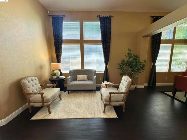 Sitting room featuring a textured wall