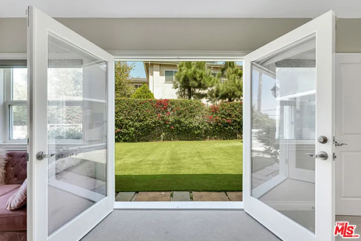 Primary Bedroom French Doors t