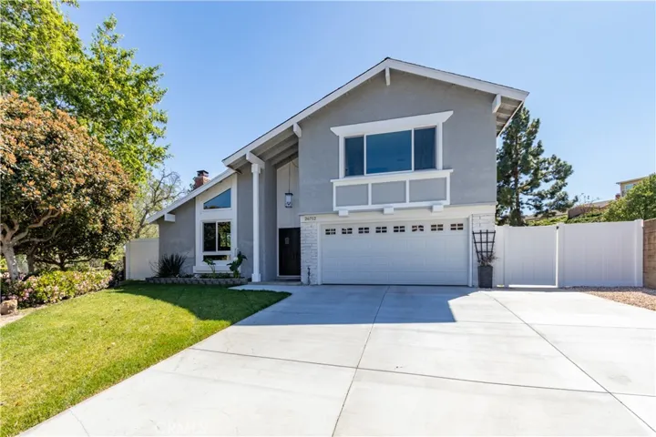 Two-car garage and extra wide driveway and side yard.