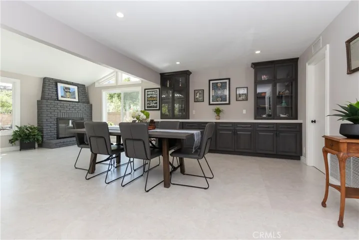Dining and family room at the back of the house with gorgeous built-in cabinets.