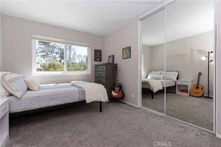 Mirrored closet in the fourth bedroom.