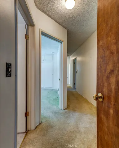 Hallway leading from kitchen to bedrooms