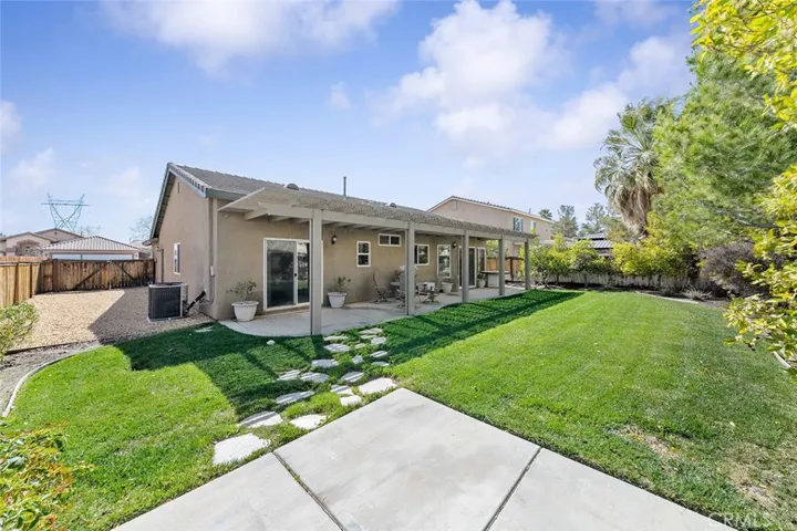 Backyard, Covered Patio, And Side Rear of Home/RV Parking