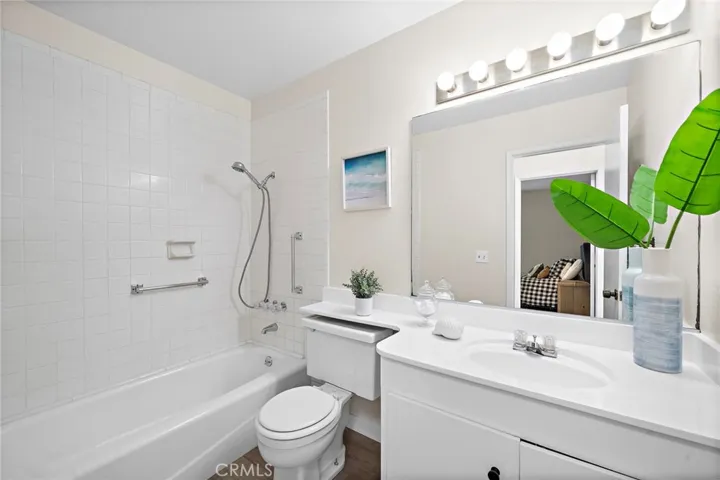 Updated hall bath with refreshed vanity and and counter tops