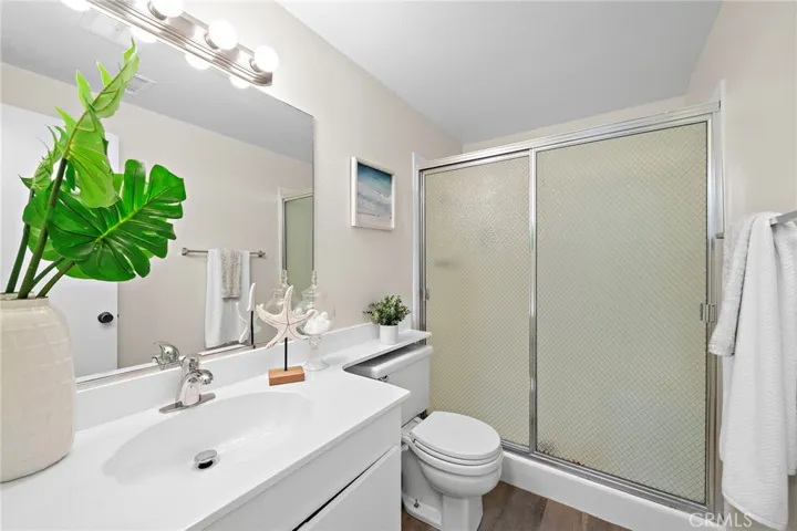 Primary suite with glass enclosed shower