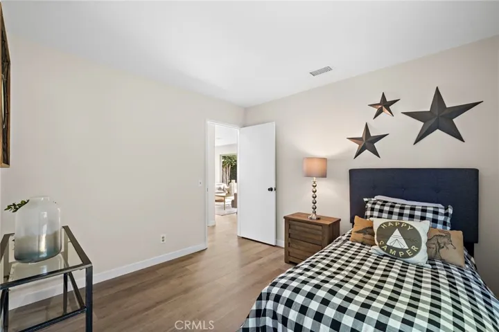 Secondary room two on first floor, conveniently located directly across from bathroom