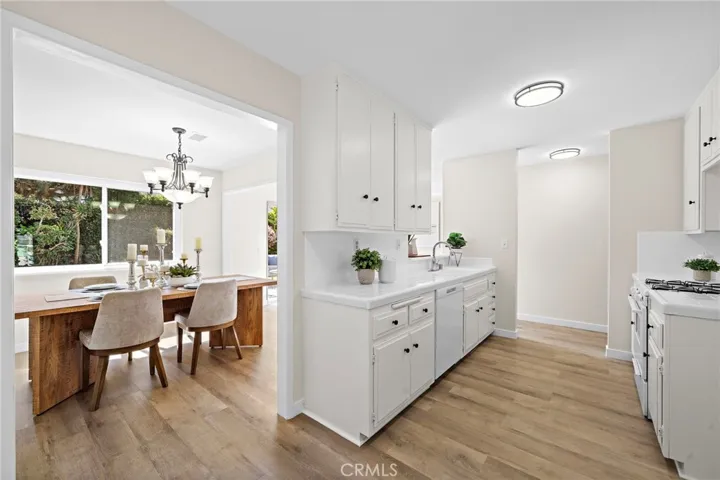 Kitchen open to formal dining room perfect for hosting your family and guests