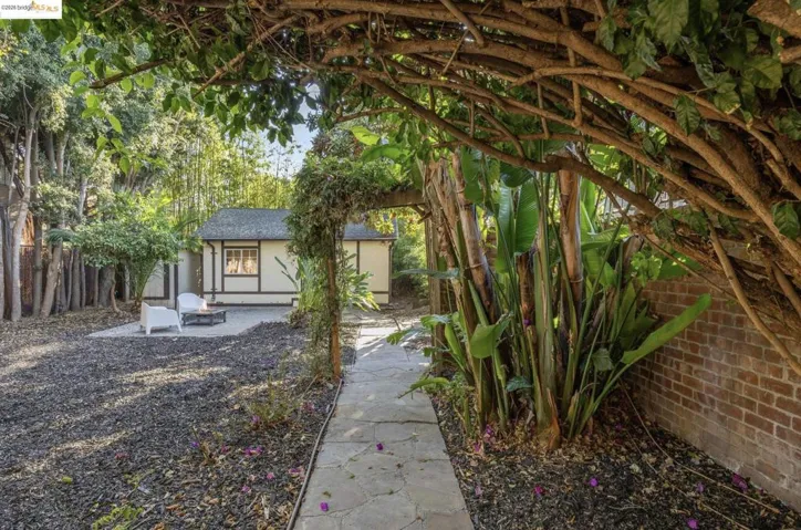 Fenced yard with a fire pit