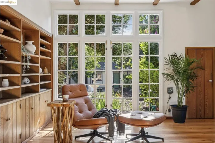 Sitting room featuring light wood-style flooring