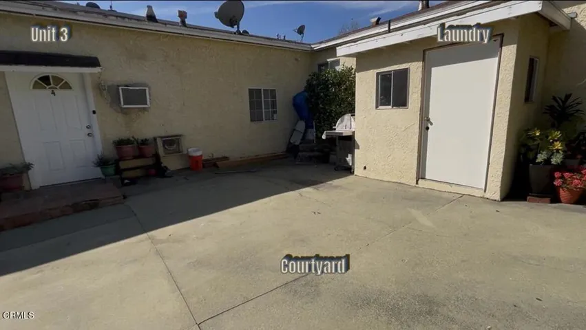 Unit 3 Left Door, Laundry Room on Right