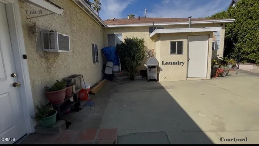 Unit 3 Door on Left Laundry Room on Ri