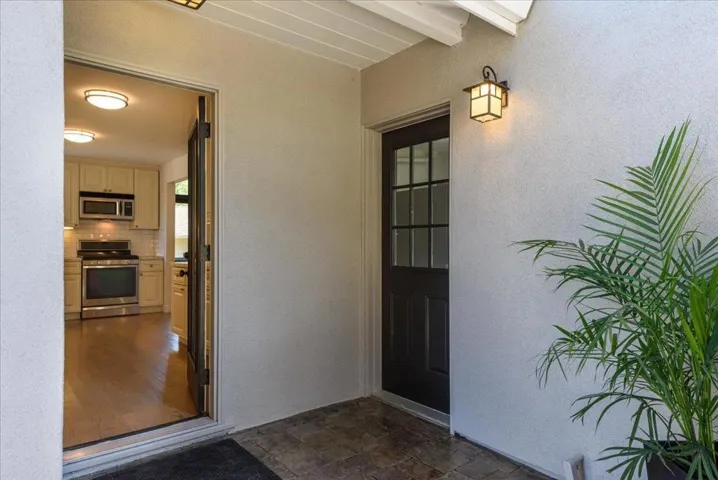 Exterior Kitchen Door breezeway to Back Garage Door