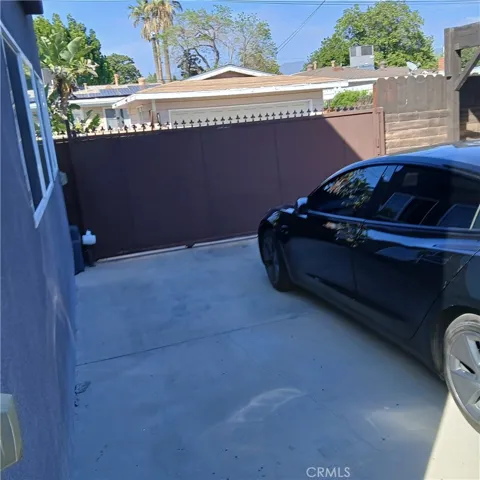 REAR GATE AND PARKING SPACES