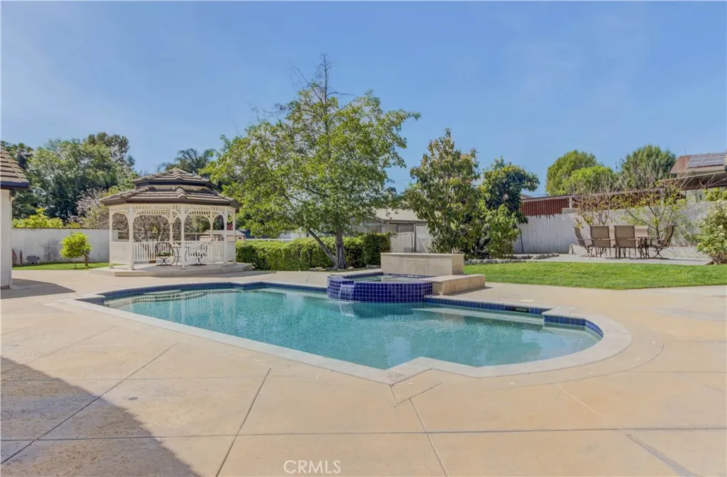 Beautiful swimmimg pool with gazebo and fruit trees