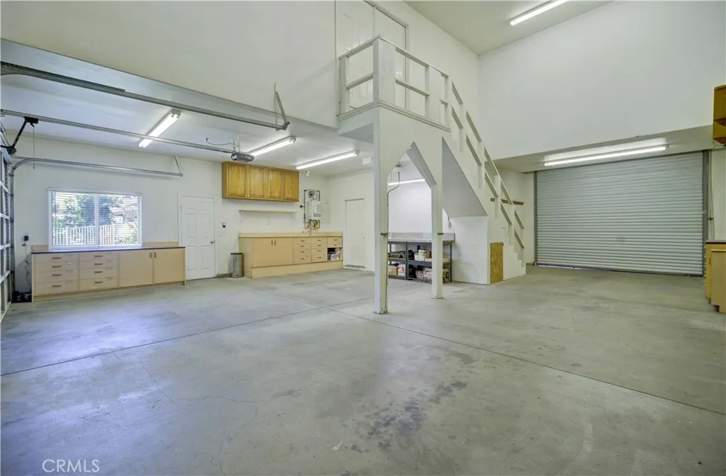 More car barn parking and workshop area.  Also second studio access.
