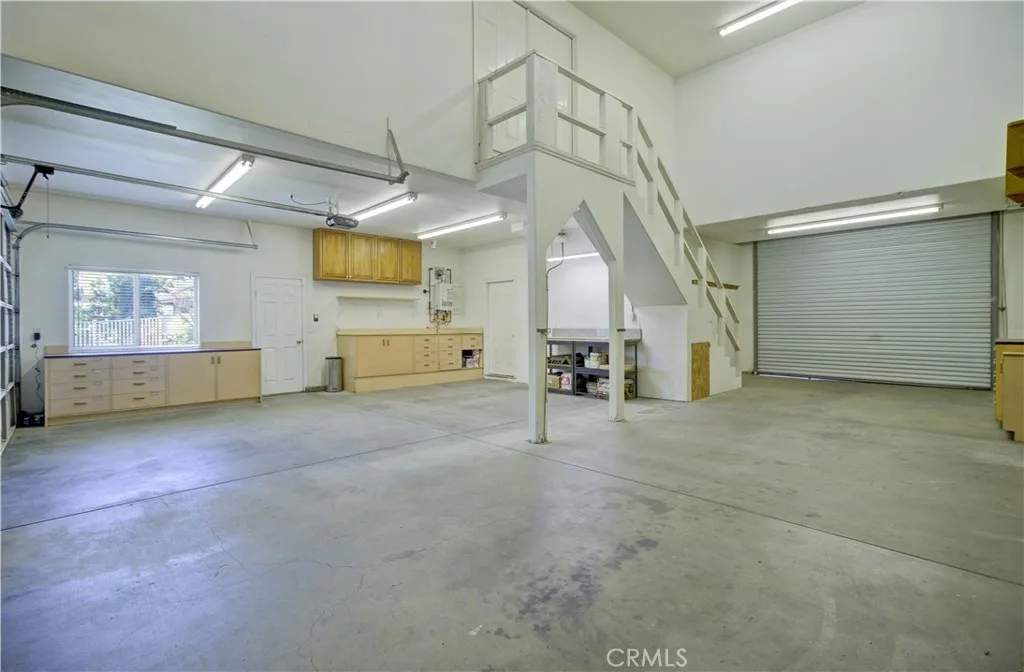 More car barn parking and workshop area.  Also second studio access.