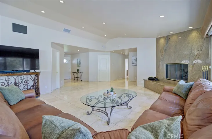 Living room looking towards entry and back bedrooms