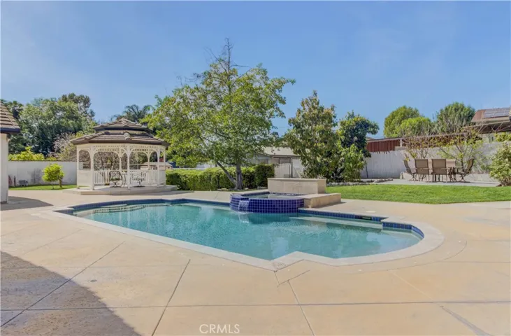 Beautiful swimmimg pool with gazebo and fruit trees