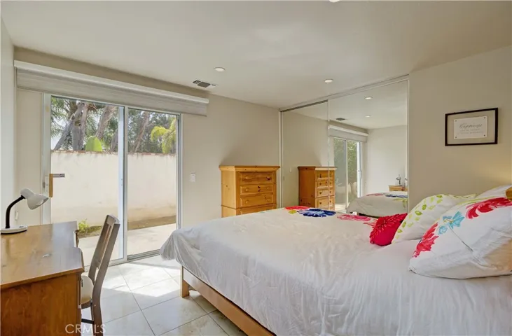 Bedroom 2 with slider to side yard