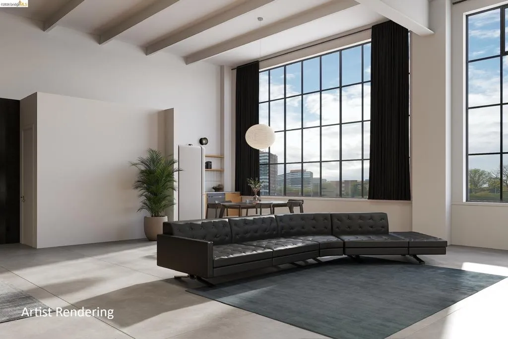 Building lobby featuring beamed ceiling and a city view