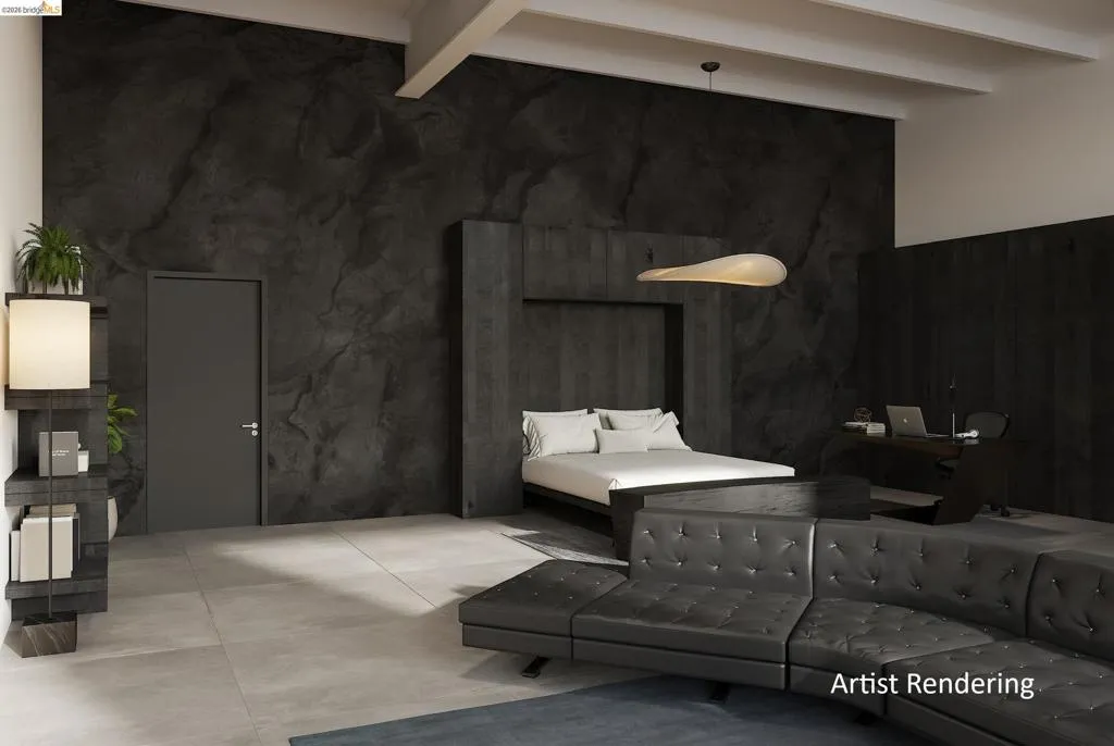 Bedroom featuring beam ceiling and concrete flooring
