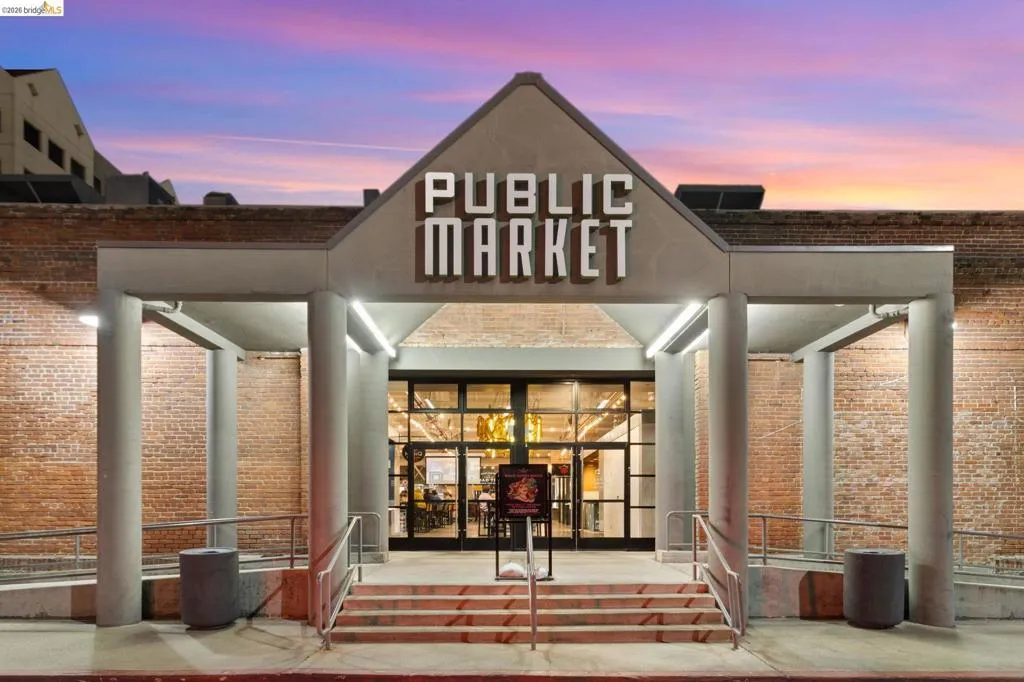Property entrance featuring brick siding