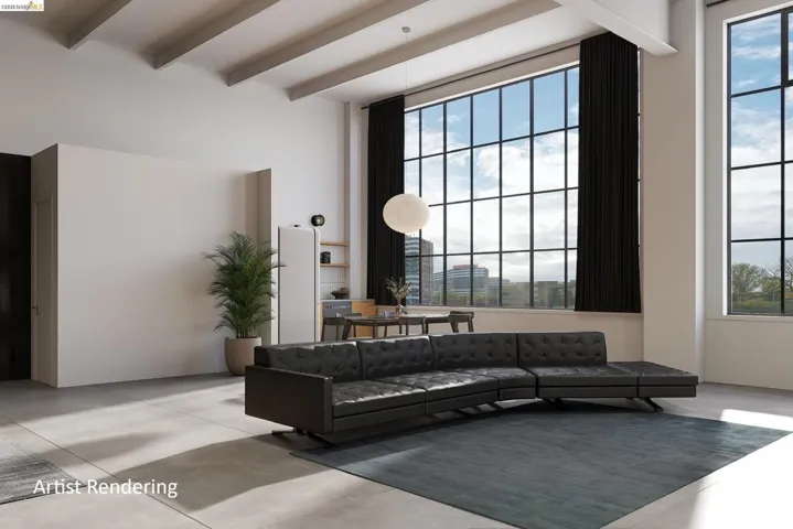Building lobby featuring beamed ceiling and a city view