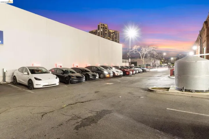 Parking at dusk featuring uncovered parking