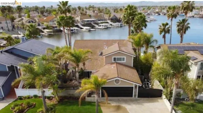 Aerial view of residential area with a large body of water