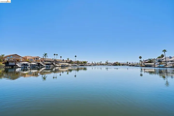 Water view featuring nearby suburban area