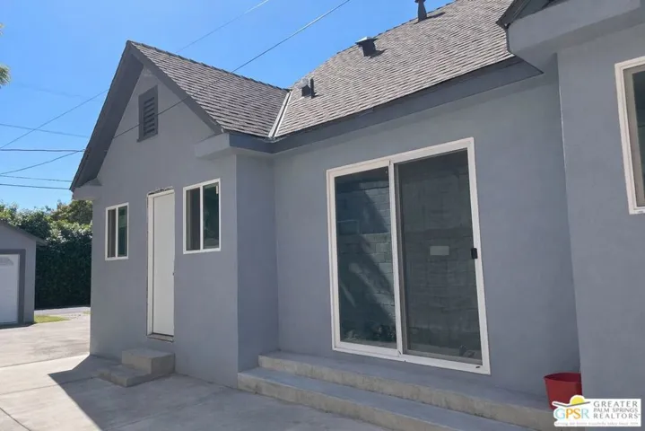 Side of property at driveway