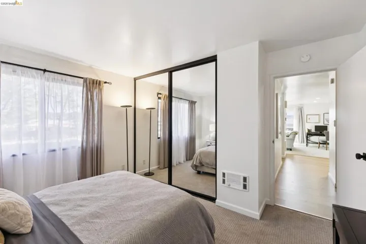 Bedroom with carpet floors and a closet
