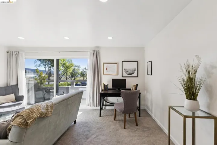 Home office featuring carpet flooring and recessed lighting