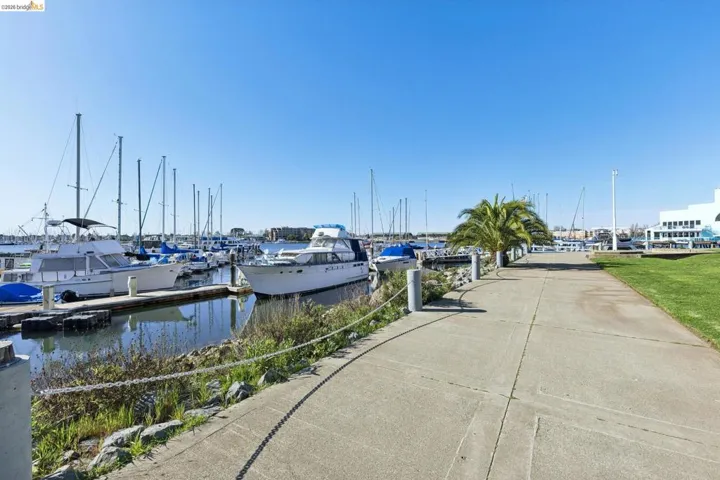 Dock area featuring view of the marina